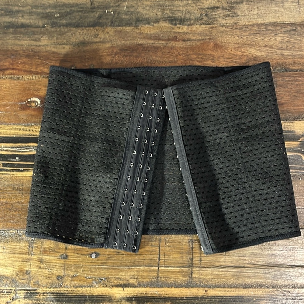 Waist clincher black with boning and adjustable hook and eye for perfect fit